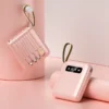 S469377563f1944e489702bd5116cddf2m.webp 20000mAh Mini Power Bank Fast Charge Portable External Battery Charger Powerbank with 4 Cables for iPhone Samsung Huawei Xiaomi