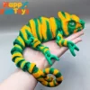 Se38f80cb41d94999bd37e899c239e44ce.webp 3D Printed Chameleon Dragon Toy – Flexible Multi-Joint Articulated Figure